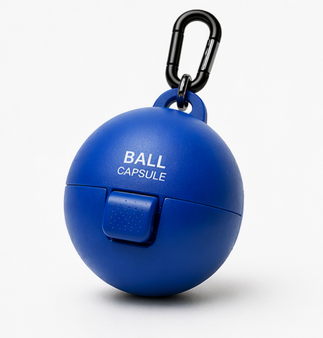 Blue Ball Capsule dog tennis ball holder with carabiner clip on a clean background.